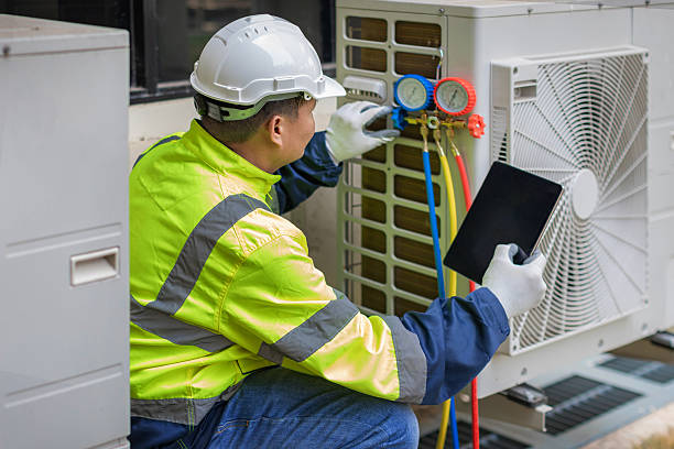 Professional Hvac Installation technician working in Calera, AL
